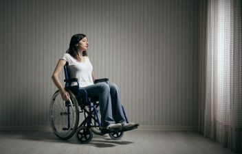 photodune-4814427-sad-woman-sitting-on-wheelchair-m.jpg